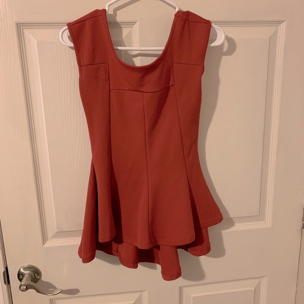 Orange peplum top
